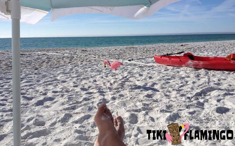 A plastic pink lawn flamingo makes a perfect companion for the beach!